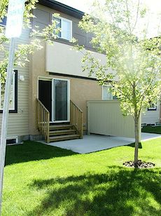 Rear+view Calgary 3 bedrooms Townhouse for rent. Property photo: 14116-2