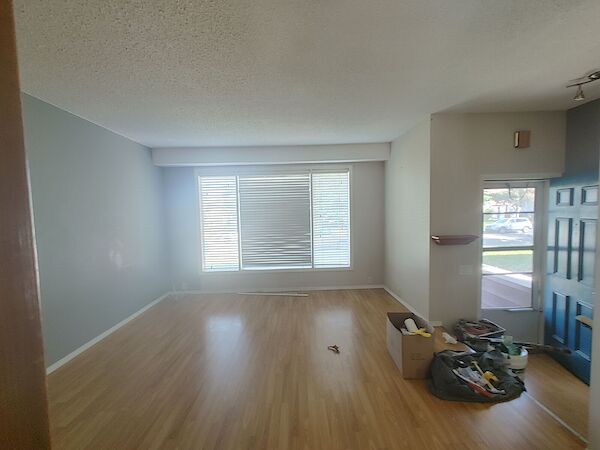 Main+Living+room+-+walls+painted+grey Calgary 4 bedrooms Duplex for rent. Property photo: 487605-2