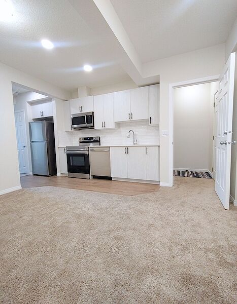 Living+area+and+open+concept+kitchen Calgary 2 bedrooms Basement for rent. Property photo: 511886-3