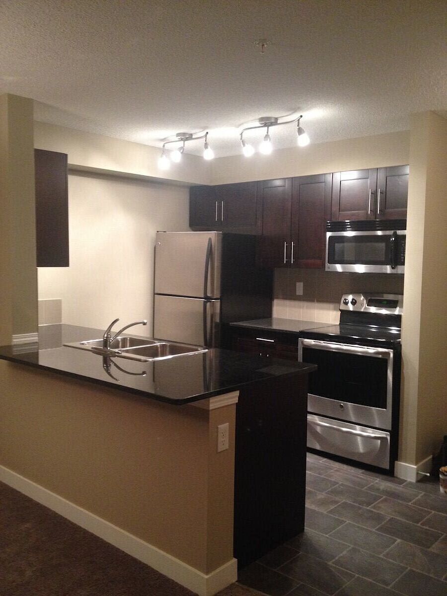 Airdrie 2 bedrooms Condo Unit for rent. Property photo: 59061-1