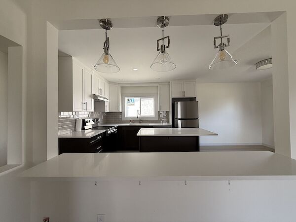 Main+Floor+Kitchen+with+Pendant+Lights Edmonton 3 bedrooms Main Floor for rent. Property photo: 601024-3