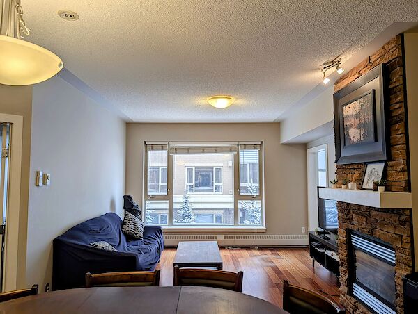 Floor+to+ceiling+window+with+courtyard+view Calgary 2 + Den bedrooms Condo Unit for rent. Property photo: 606379-2