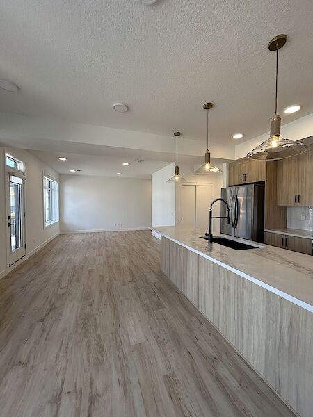 Open+concept+kitchen+living+and+dining+areas Calgary 3 bedrooms Townhouse for rent. Property photo: 632586-3