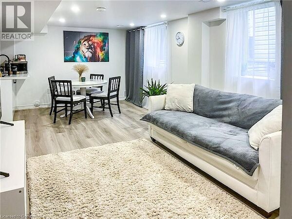Living+room+with+healthy+amount+of+natural+light+recessed+lighting+wood+finished+floors+and+baseboards Hamilton 2 bedrooms House for rent. Property photo: 637755-2