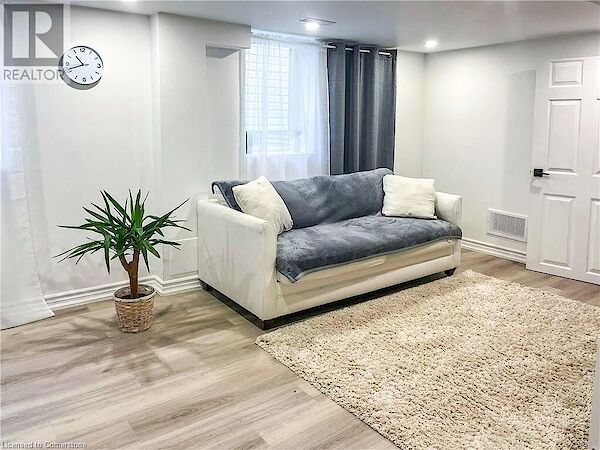 Living+room+featuring+light+wood+finished+floors+baseboards+and+recessed+lighting Hamilton 2 bedrooms House for rent. Property photo: 637755-3