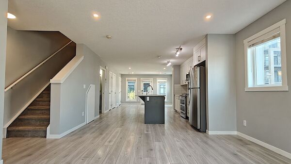 Open+plan+Lounge+with+washroom Calgary 3 + Den bedrooms Townhouse for rent. Property photo: 640984-3
