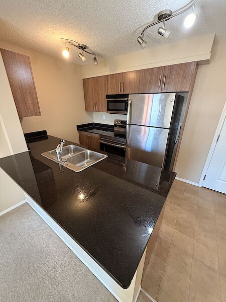 Airdrie 2 + Den bedrooms Condo Unit for rent. Property photo: 685065-2